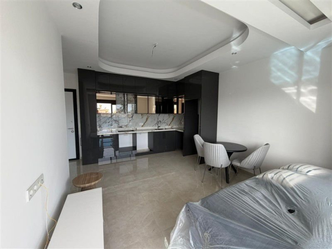 Современная 1+1 в центре Алании с отельной инфраструктурой и разрешением на аренду