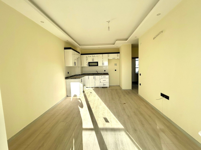 Новая 1+1 в Авсалларе с видом на город и природное окружение