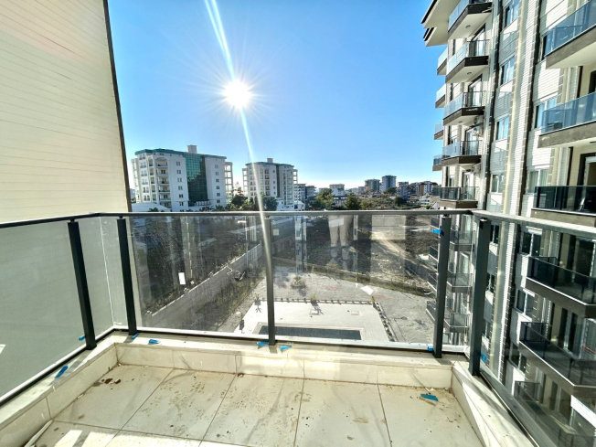 Новая 1+1 в Авсалларе с видом на город и природное окружение