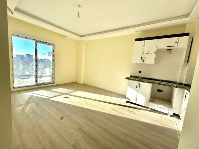 Новая 1+1 в Авсалларе с видом на город и природное окружение