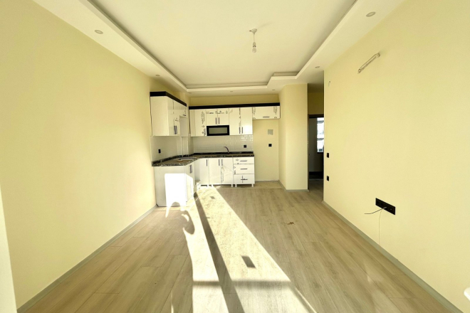 Новая 1+1 в Авсалларе с видом на город и природное окружение