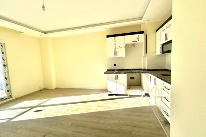 Новая 1+1 в Авсалларе с видом на город и природное окружение