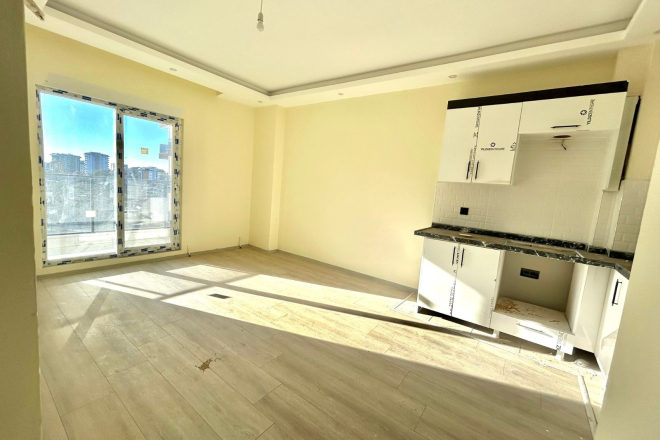 Новая 1+1 в Авсалларе с видом на город и природное окружение