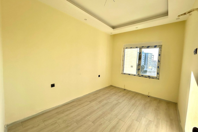 Новая 1+1 в Авсалларе с видом на город и природное окружение