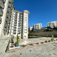 Новая 1+1 в Авсалларе с видом на город и природное окружение