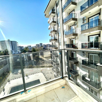 Новая 1+1 в Авсалларе с видом на город и природное окружение