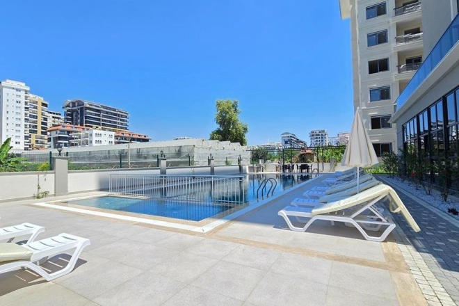 1+1 в новостройке Махмутлара в шаговой доступностью к морю, при 50% оплате беспроцентная рассрочка