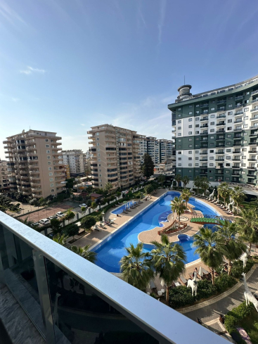 Комфортная квартира с курортной атмосферой для жизни и дохода в Махмутларе