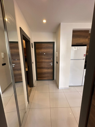 Комфортная квартира с курортной атмосферой для жизни и дохода в Махмутларе