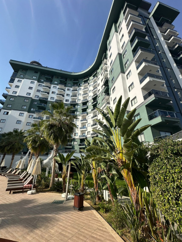 Комфортная квартира с курортной атмосферой для жизни и дохода в Махмутларе