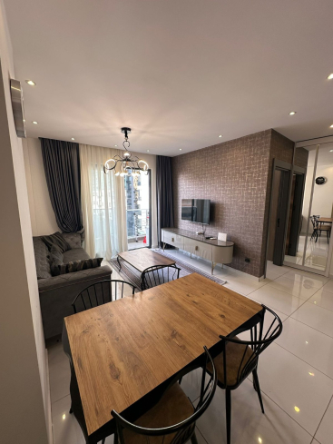 Комфортная квартира с курортной атмосферой для жизни и дохода в Махмутларе