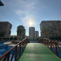 Комфортная квартира с курортной атмосферой для жизни и дохода в Махмутларе