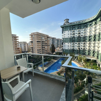 Комфортная квартира с курортной атмосферой для жизни и дохода в Махмутларе