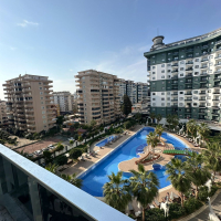 Комфортная квартира с курортной атмосферой для жизни и дохода в Махмутларе