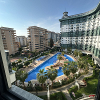 Комфортная квартира с курортной атмосферой для жизни и дохода в Махмутларе