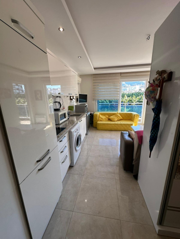 Компактная студия у моря в Махмутларе для отдыха и ликвидной покупки. Супер Цена