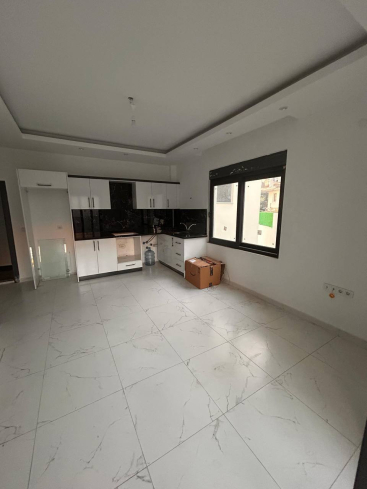 YENİ BİNA DA EŞYASIZ ACİL SATILIK 1+1