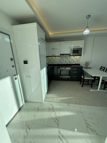 Mahmutlar'da 1+1 geniş eşyalı fırsat daire