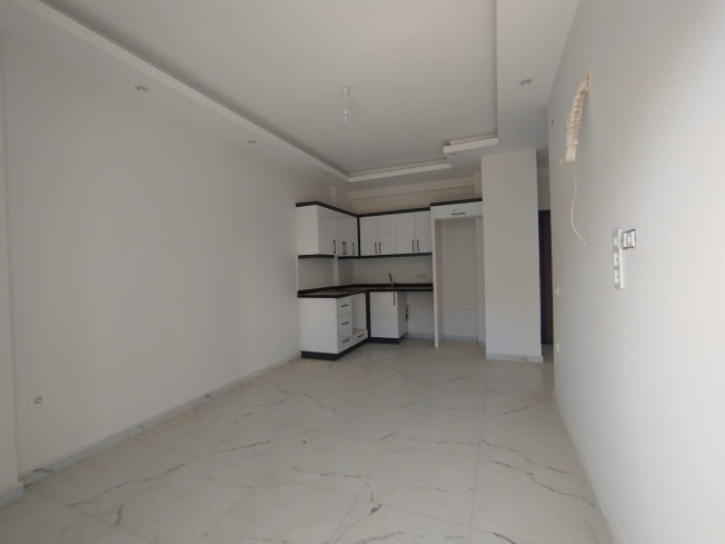 AKTİVİTELİ , DENİZE 350 mt. EŞYASIZ 1+1 SATILIK DAİRE