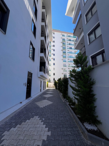 AKTİVİTELİ , DENİZE 350 mt. EŞYASIZ 1+1 SATILIK DAİRE