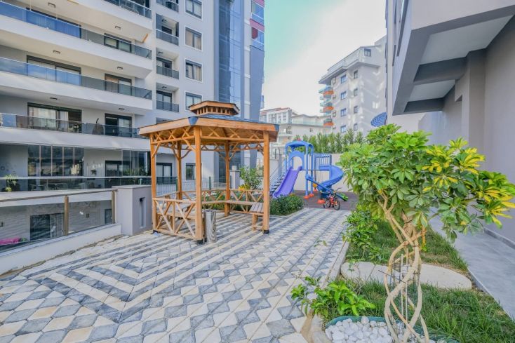 Светлая квартира с панорамными видами в новом доме Махмутлара для жизни и аренды