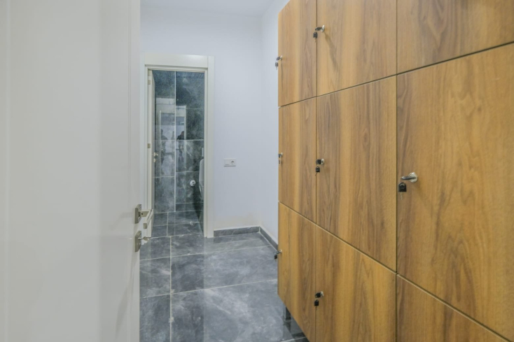 Светлая квартира с панорамными видами в новом доме Махмутлара для жизни и аренды