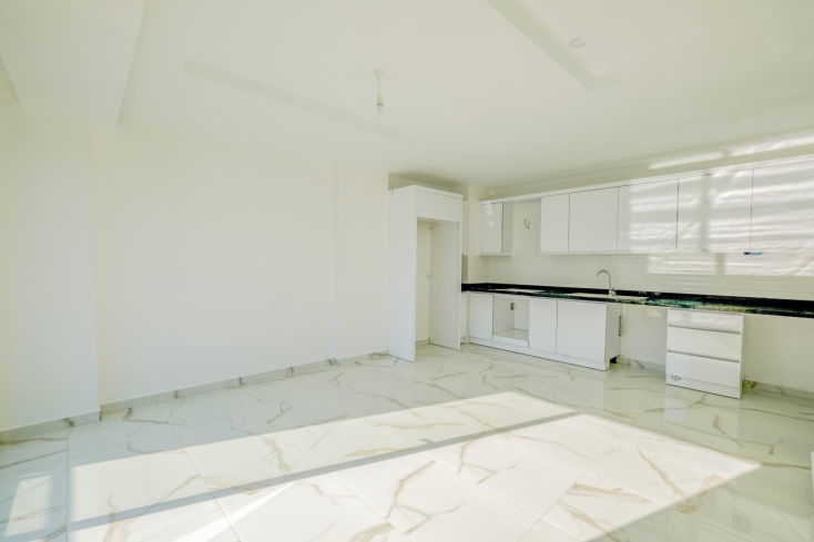 Светлая квартира с панорамными видами в новом доме Махмутлара для жизни и аренды