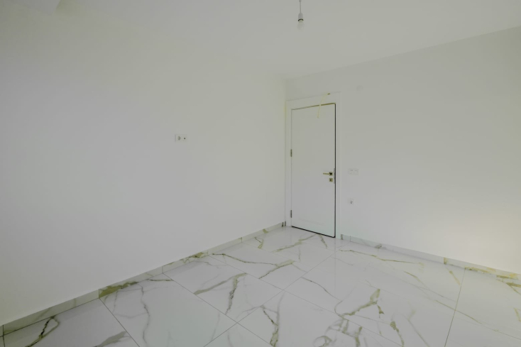 Светлая квартира с панорамными видами в новом доме Махмутлара для жизни и аренды