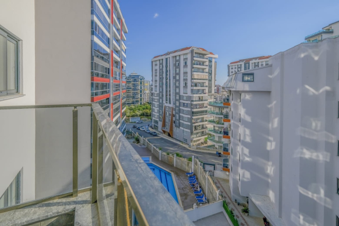 Светлая квартира с панорамными видами в новом доме Махмутлара для жизни и аренды