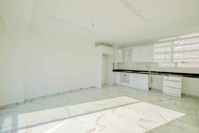 Светлая квартира с панорамными видами в новом доме Махмутлара для жизни и аренды