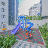 Светлая квартира с панорамными видами в новом доме Махмутлара для жизни и аренды