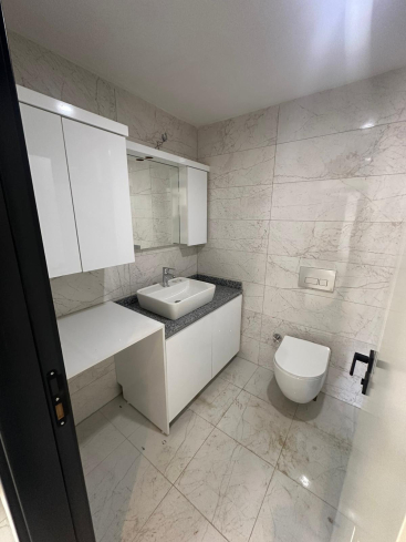 MERKEZİ KONUMDA YENİ KOMPLEX İÇERİSİNDE 2+1 SATILIK DAİRE