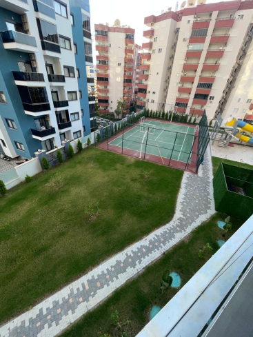 Новая квартира 1+1 с полной инфраструктурой в Махмутларе для жизни и дохода