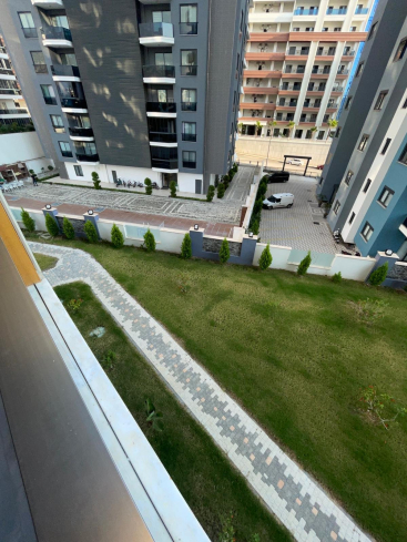 Новая квартира 1+1 с полной инфраструктурой в Махмутларе для жизни и дохода