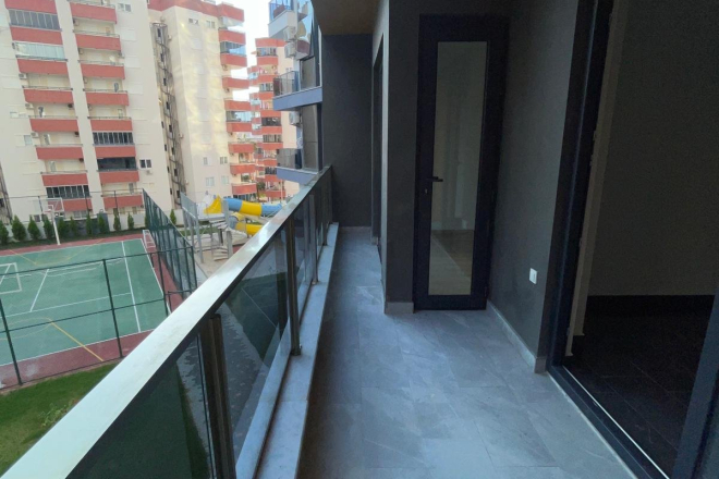 New 1+1 apartment in Mahmutlar with full on-site facilities