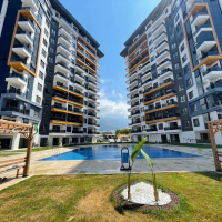 Новая квартира 1+1 с полной инфраструктурой в Махмутларе для жизни и дохода