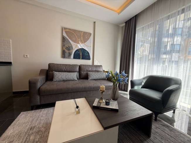 Современная 1+1 квартира в Махмутларе с расширенной инфраструктурой для отдыха