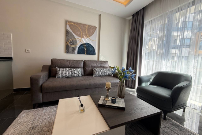 Современная 1+1 квартира в Махмутларе с расширенной инфраструктурой для отдыха