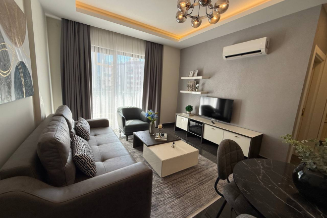 Современная 1+1 квартира в Махмутларе с расширенной инфраструктурой для отдыха