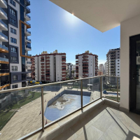 Современная 1+1 квартира в Махмутларе с расширенной инфраструктурой для отдыха