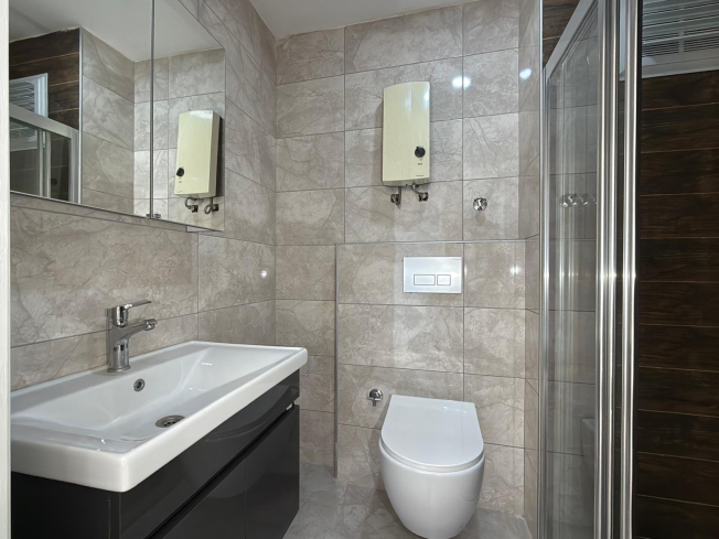 Новая 1+1 квартира в Махмутларе — 500 м до моря и центр в шаговой доступности