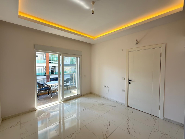 Новая 1+1 квартира в Махмутларе — 500 м до моря и центр в шаговой доступности