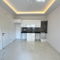 Новая 1+1 квартира в Махмутларе — 500 м до моря и центр в шаговой доступности