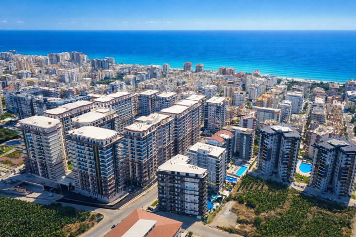 Недвижимость в Алании для гражданства — 2 квартиры 2+1 в Махмутларе, новые комплексы у моря