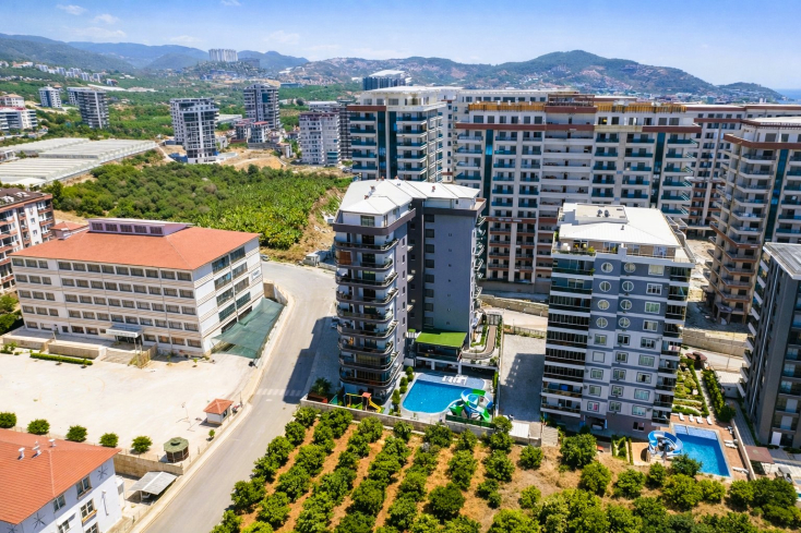 Недвижимость в Алании для гражданства — 2 квартиры 2+1 в Махмутларе, новые комплексы у моря