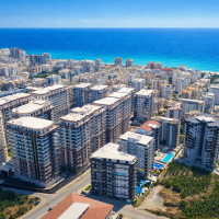 Недвижимость в Алании для гражданства — 2 квартиры 2+1 в Махмутларе, новые комплексы у моря