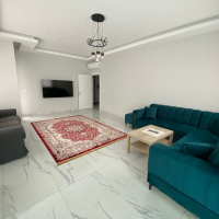 Просторная квартира с отдельной кухней в центре Алании рядом с морем