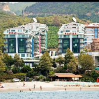 Садовый дуплекс 3+1 в Каргыджаке у моря — для жизни, отдыха и покупки под гражданство