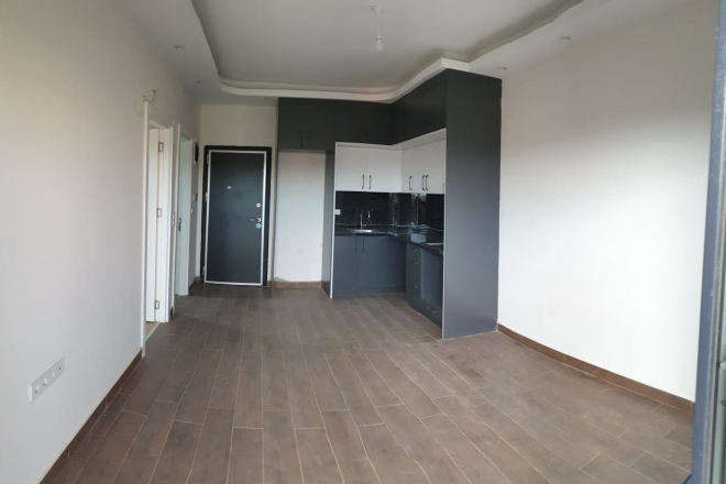 Недорогая квартира 1+1 в Алании (Оба) — новая, с инфраструктурой, подходит для жизни и инвестиций