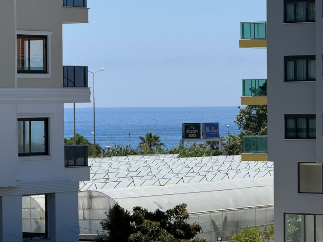 Новая квартира 1+1 в Каргыджаке в 150 м от моря — современный комплекс с бассейнами и SPA